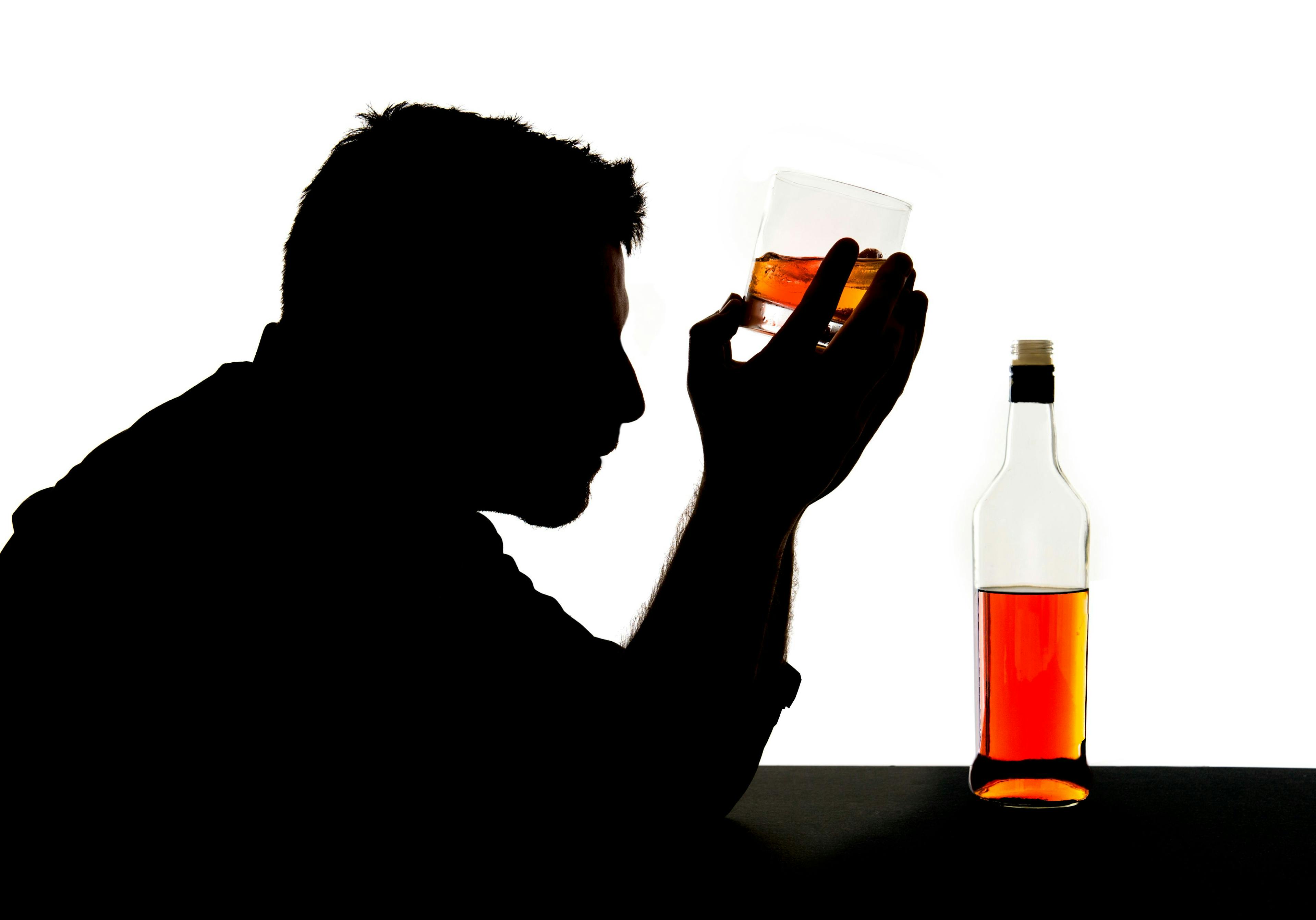 Silhouette of a man drinking alcohol | Image credit: © Wordley Calvo Stock - stock.adobe.com