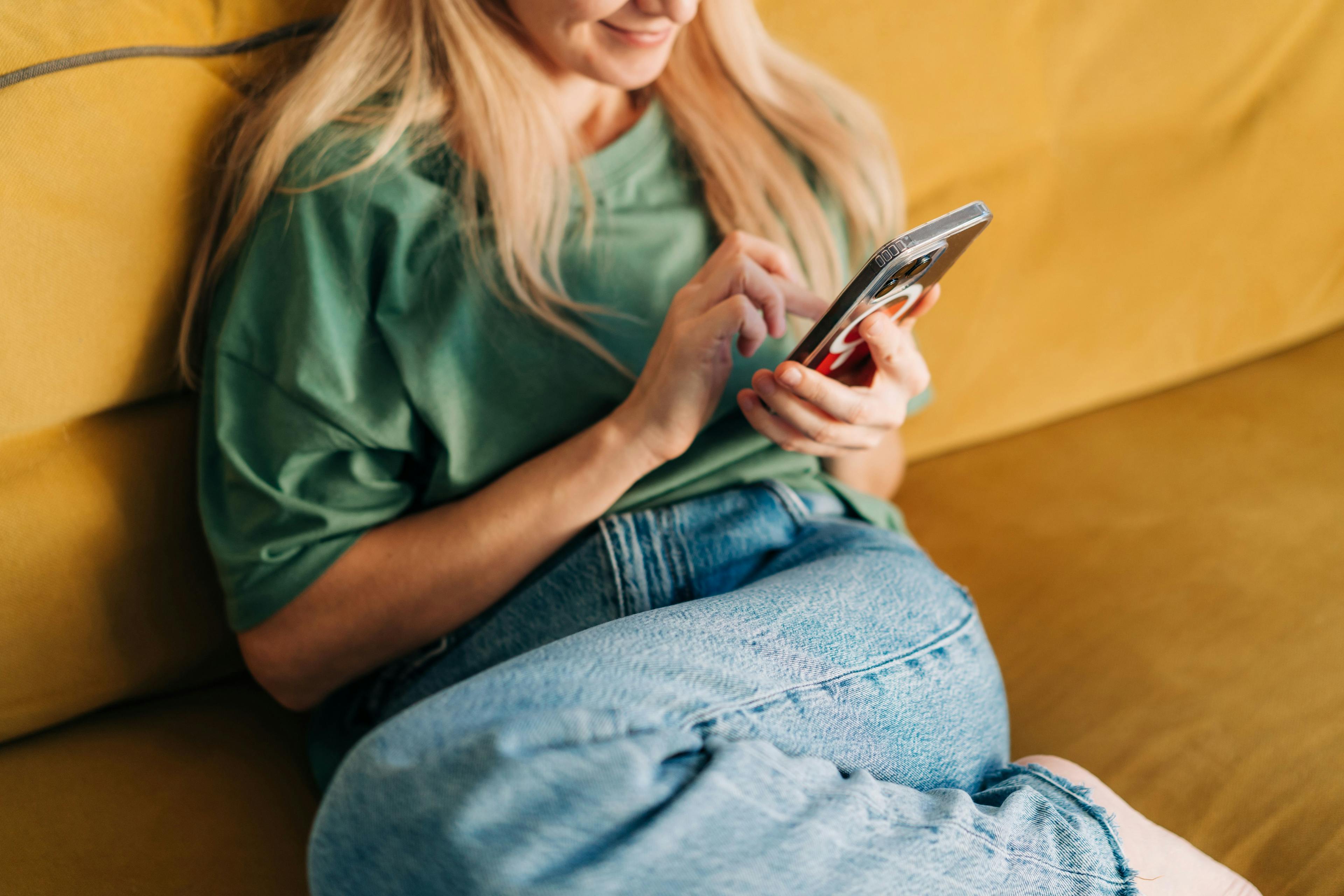 Person scrolling on phone| Image Credit: © Ilona - stock.adobe.com