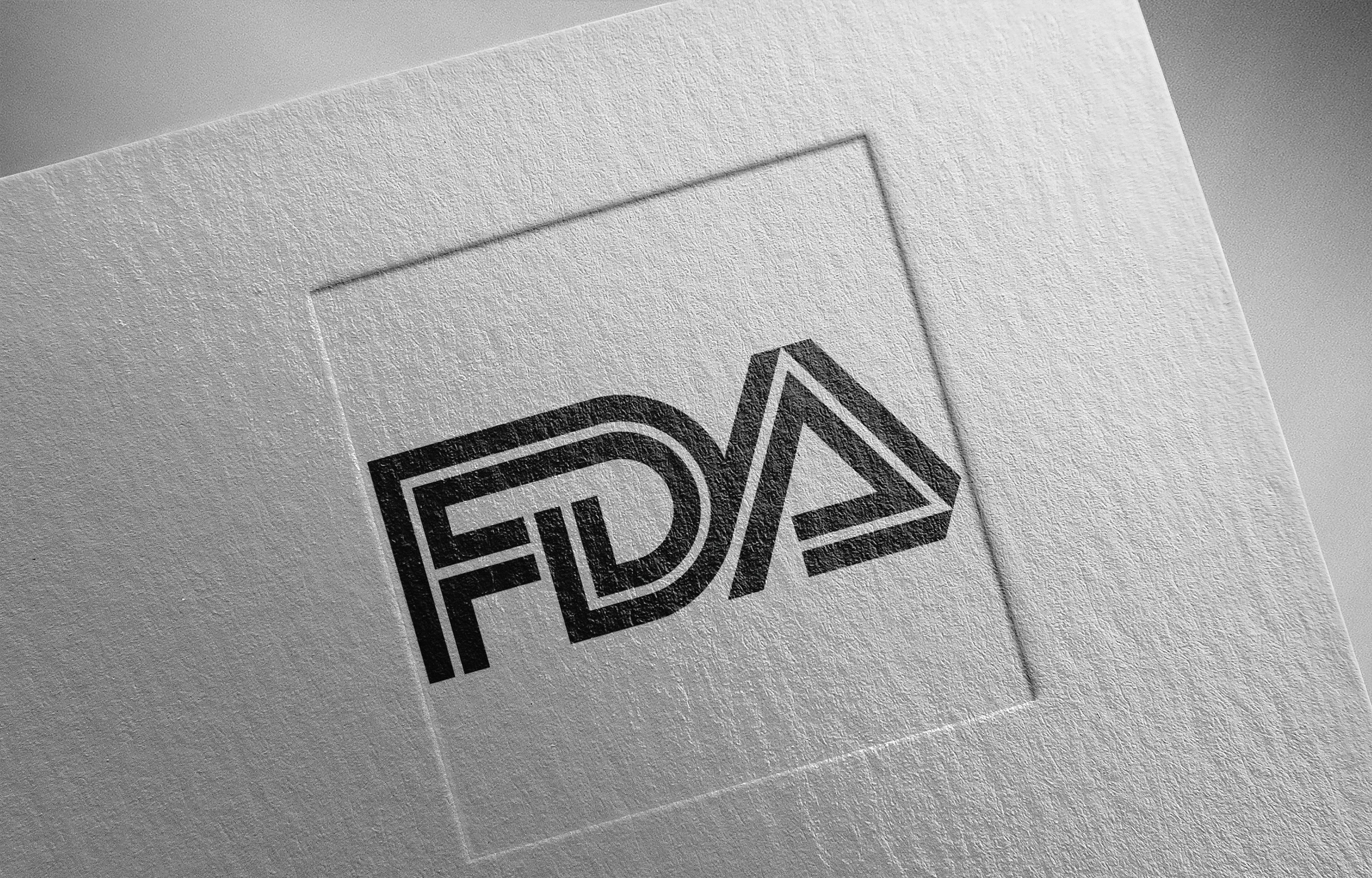 "FDA" on textured paper