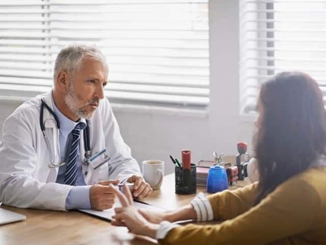 Dermatologist Treating Patient | Image Credit: © Miiskin - dermnetnz.org